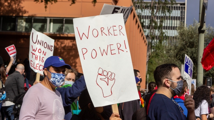Workers protesting with signs