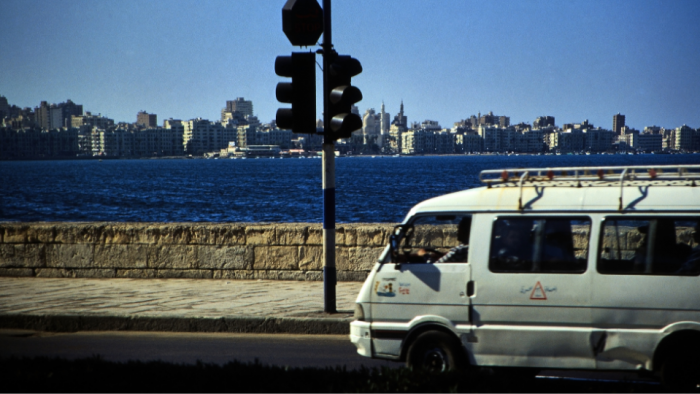 Van driving by the seaside in Alexandria